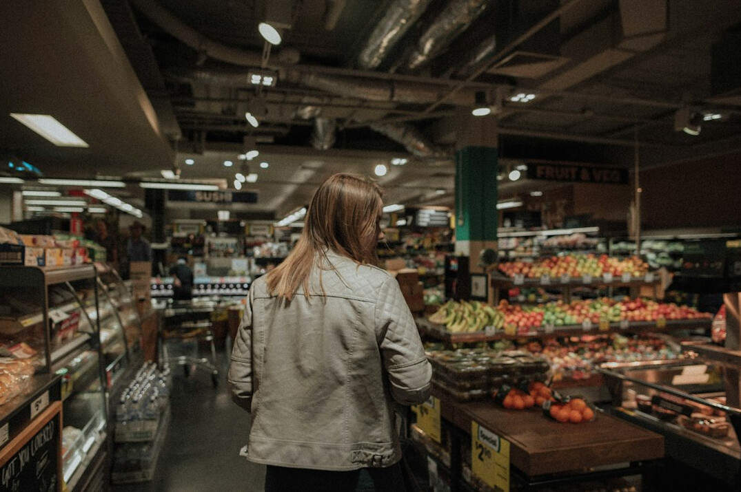 store detective watching aisle