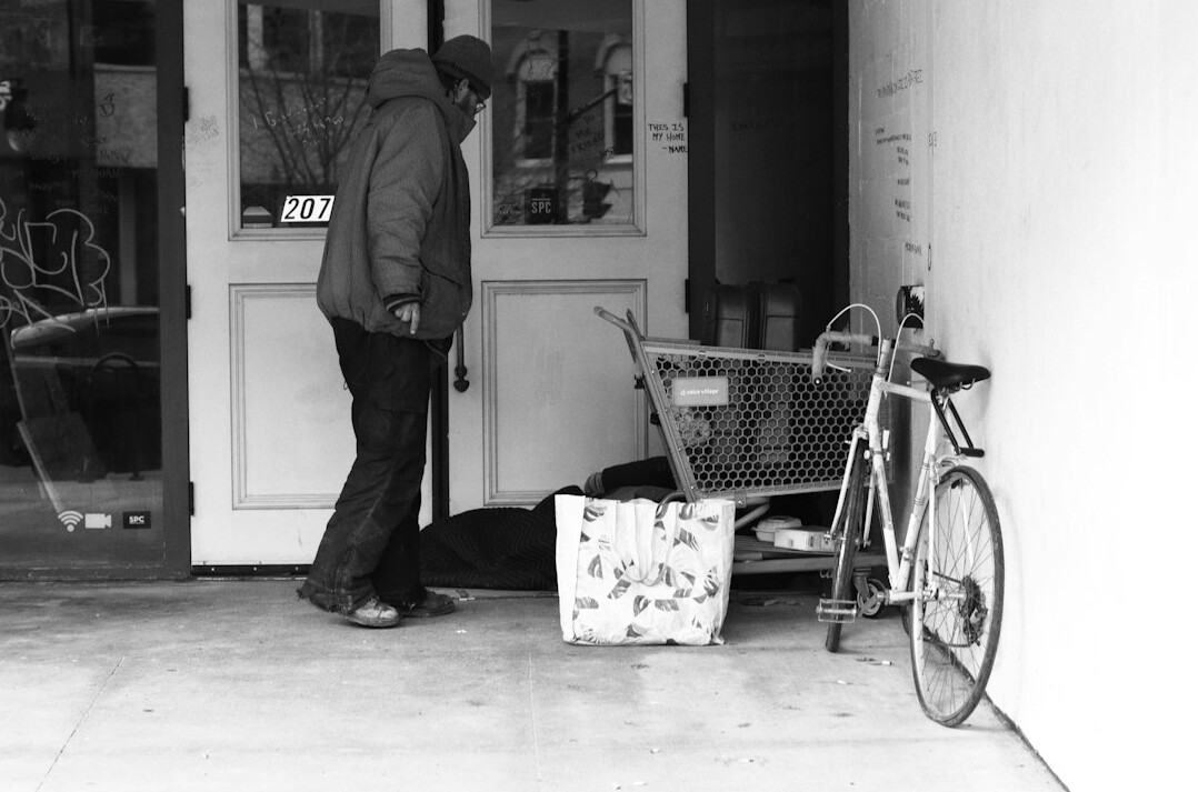 thief hiding items in bag
