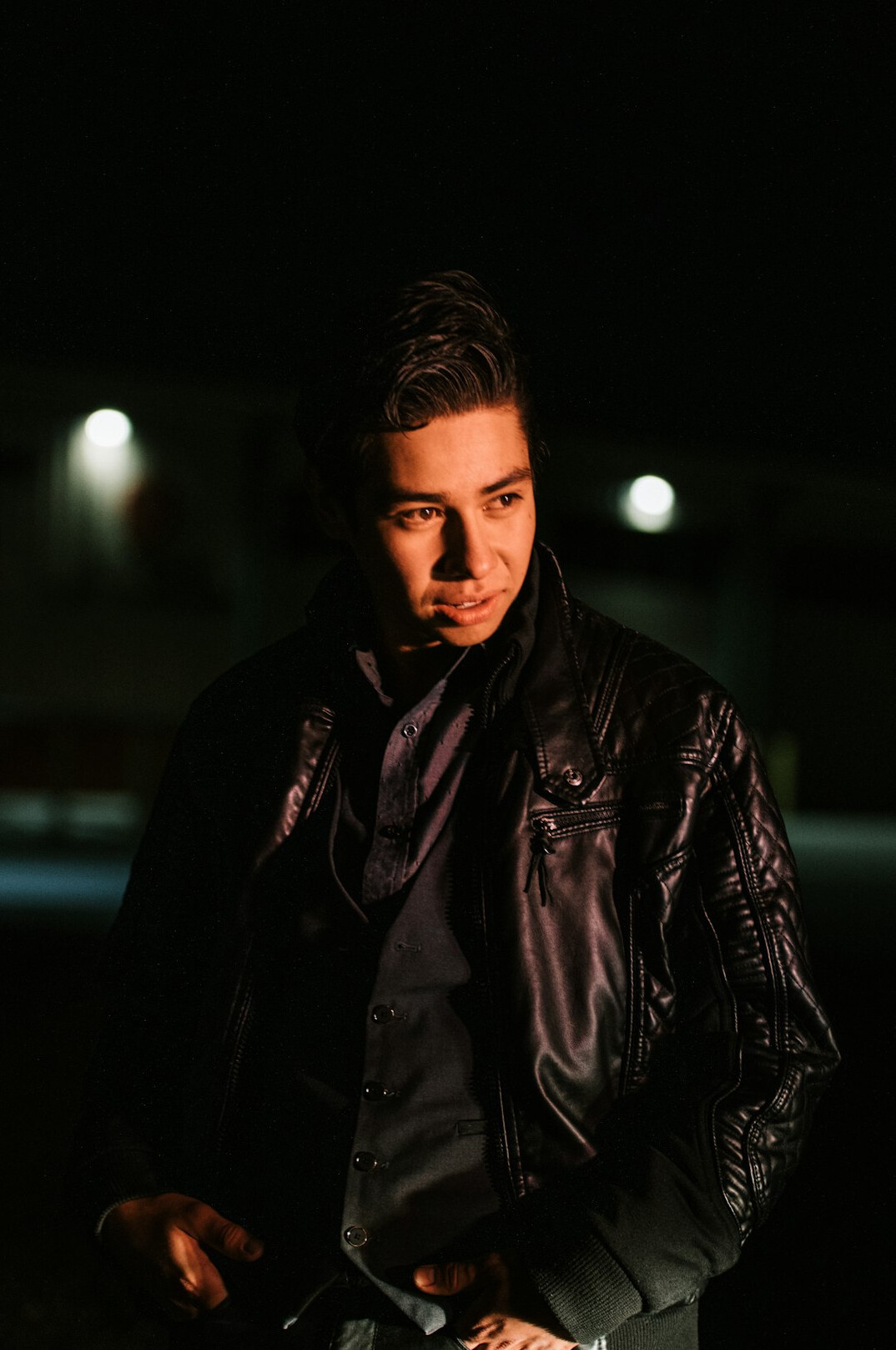 Portrait of a Hispanic man in a suit jacket