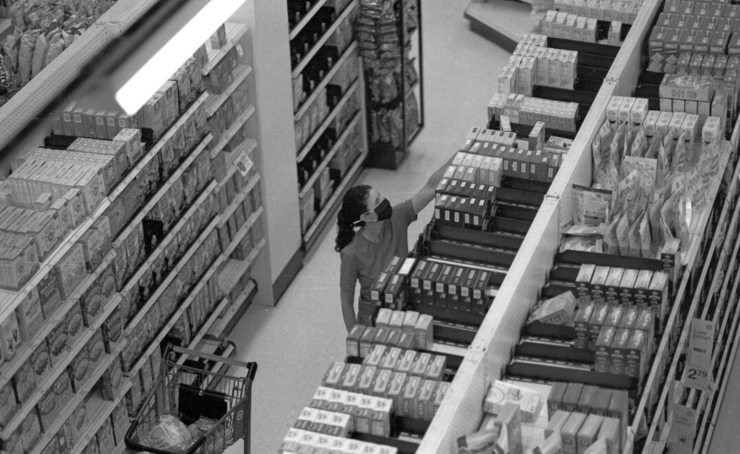 store detective watching customers